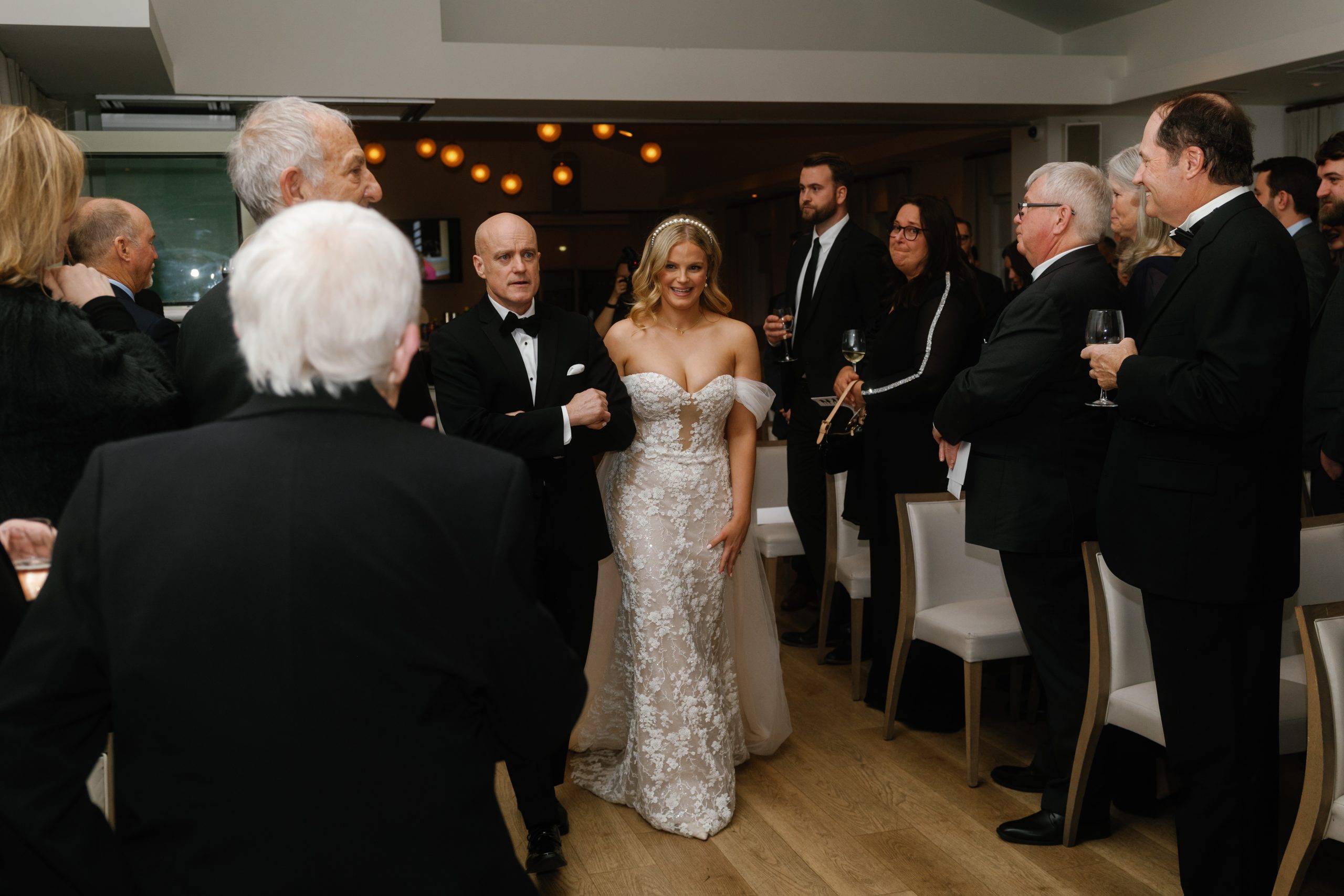 bride walks down the aisle at Sassafras Toronto